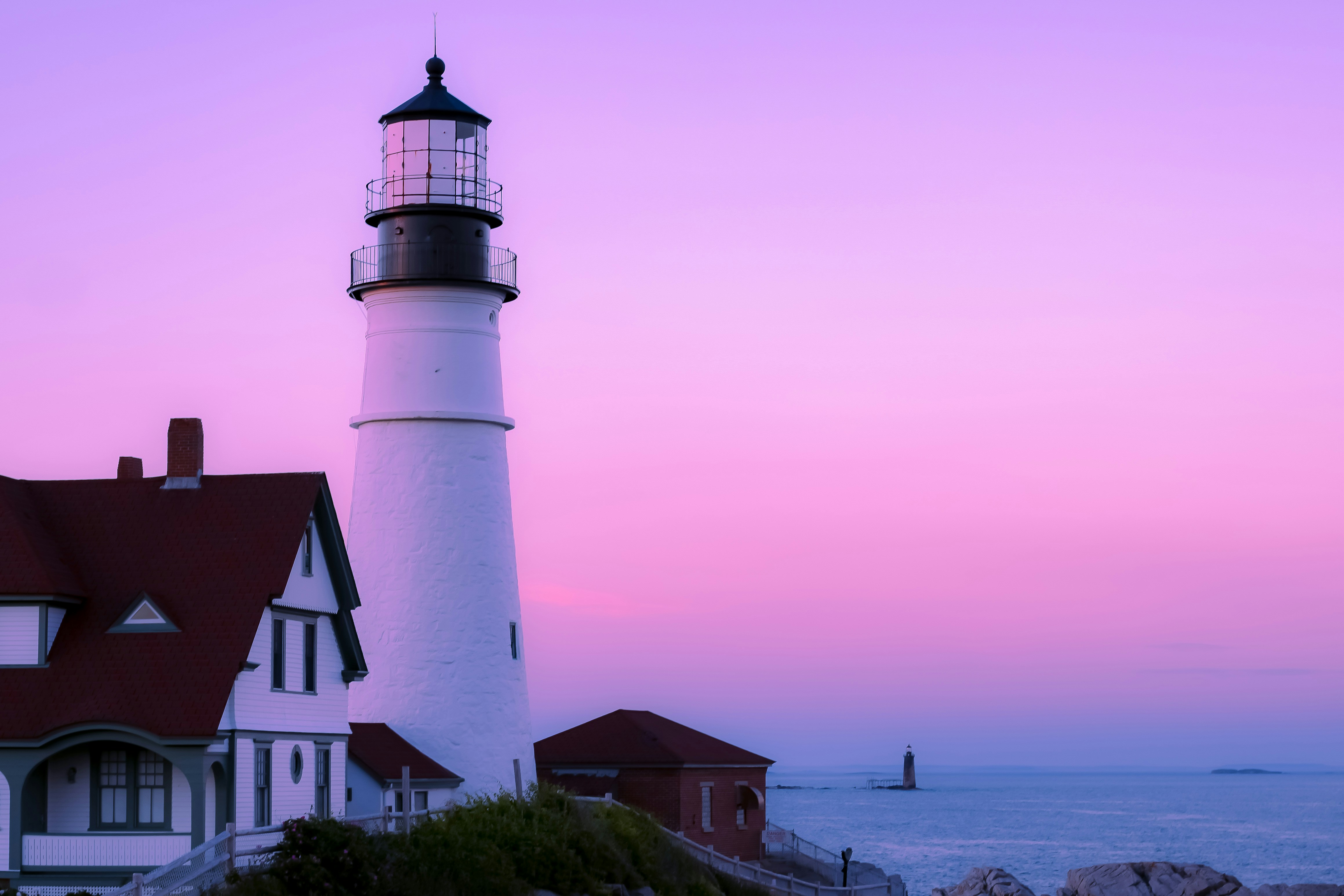 Portland Head Light in a pastel pink and purple sunset